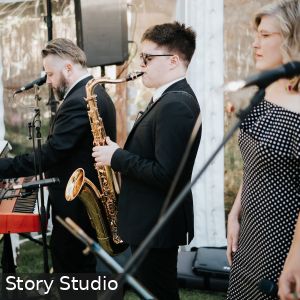 Emile Ryjoch playing saxophone and Jonathan Ruse playing keyboard and Katie Fielder performing at a wedding in Hahndorf Adelaide South Australia as part of Cruse Entertainment