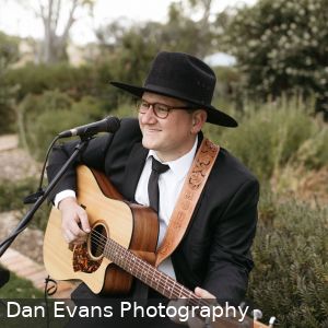 Marly Cruse from Cruse Entertainment playing acoustic guitar at a wedding at Kingsford Homestead in South Australia 2
