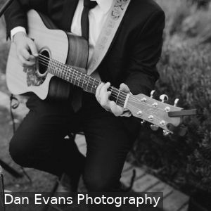 Marly Cruse from Cruse Entertainment playing acoustic guitar at a wedding at Kingsford Homestead in South Australia 3