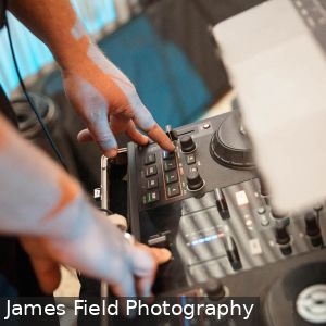 Close up of Marly Cruse from Cruse Entertainment DJing a wedding at Howard Vineyard in Adelaide South Australia